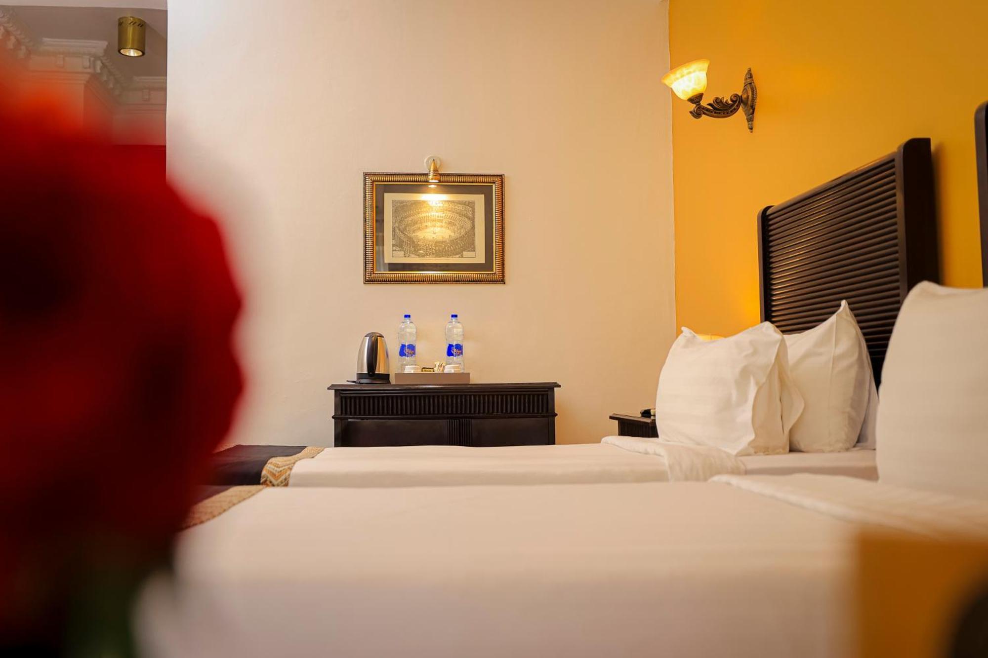 Colosseum Boutique Hotel & Spa Daressalam Zimmer foto